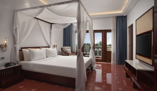 Luxury Suite with Living Room and Balcony ( Partial Garden View )