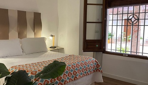 Aparta-suite El Arco