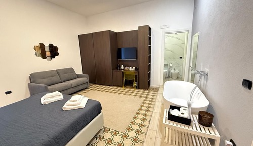 Deluxe Quadruple Room, Balcony, City View