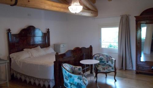 Quadruple Room with Garden View and Private Bathroom