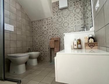 Quadruple Room with Private Bathroom