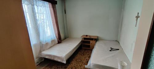 Three-Bedroom Apartment with Balcony