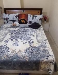 Queen Room with Shared Bathroom