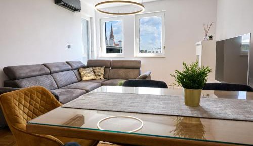 Two-Bedroom Apartment with Balcony