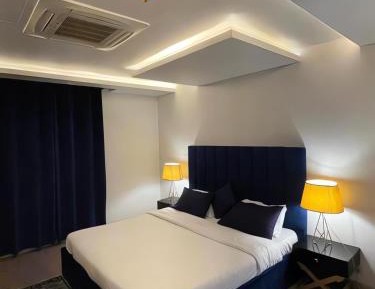 One-Bedroom Apartment with Balcony and City View