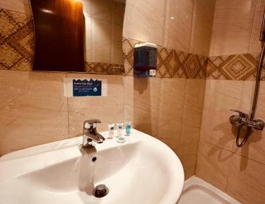 Quadruple Room with Private Bathroom