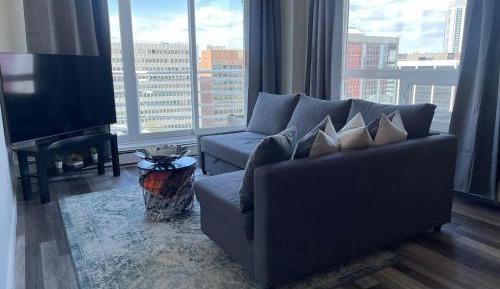 One-Bedroom Apartment with Balcony and City View