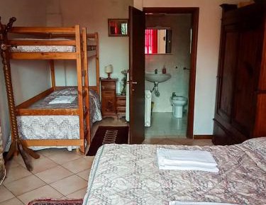 Quadruple Room with Private Bathroom