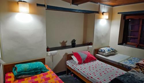 Single Bed in Dormitory Room