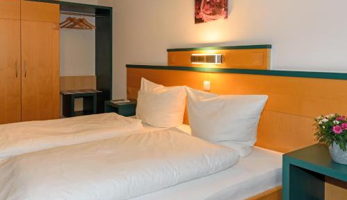 Double Room with Balcony (2 Adults + 1 Child)