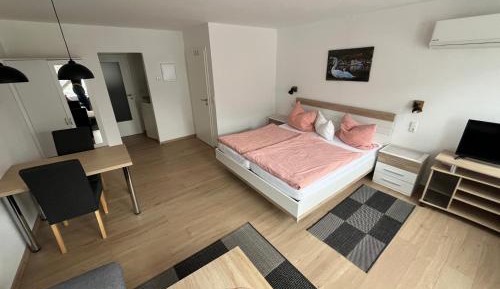 Four-Bedroom Apartment with Balcony 