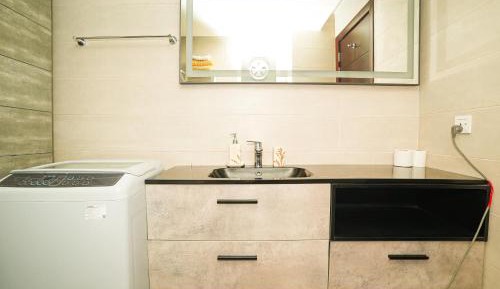 One-Bedroom Apartment with Balcony and City View