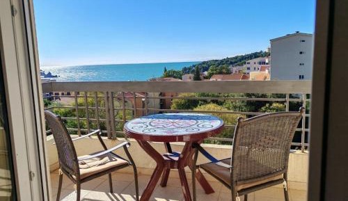 Three-Bedroom Apartment with Sea View