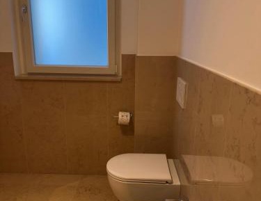 One-Bedroom Apartment with Balcony and Sea View