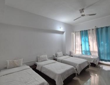 Single Bed in Dormitory Room