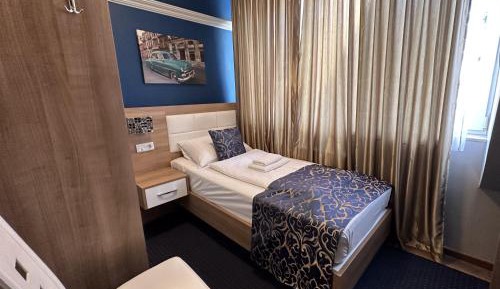 Single Room with Shared Shower and Toilet