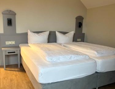 Double Room with Balcony (2 Adults + 1 Child)