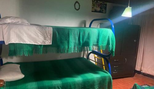 Quadruple Room with Shared Bathroom