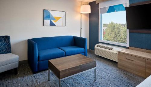 King Suite with Living Area and Sofa Bed