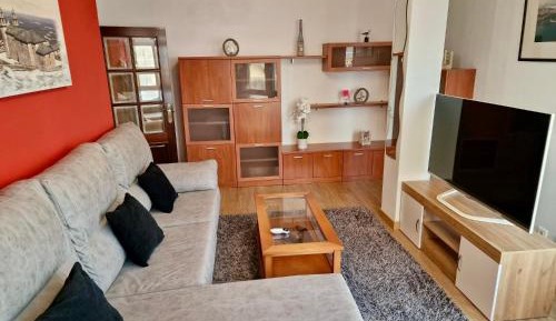 Three-Bedroom Apartment with Harbor View