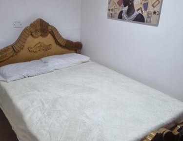 Standard Double Room with Shared Bathroom