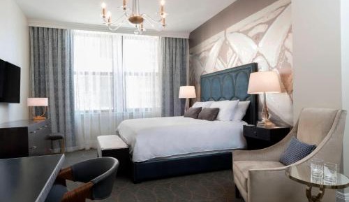 Guest room with King or Queen Beds and a sofa