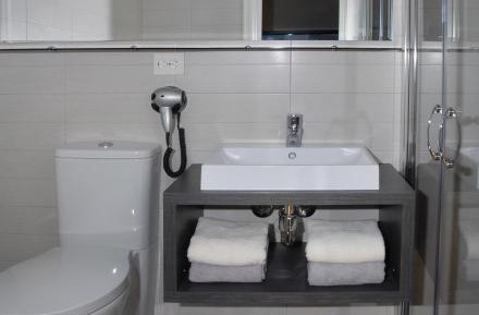 Mini room- Twin Beds (Limited/back yard view)