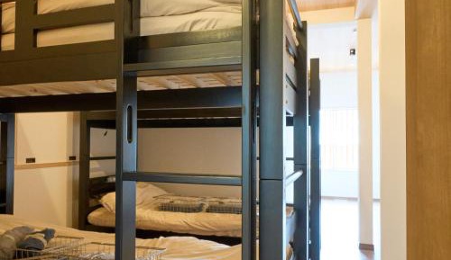 Single Bed in Dormitory Room
