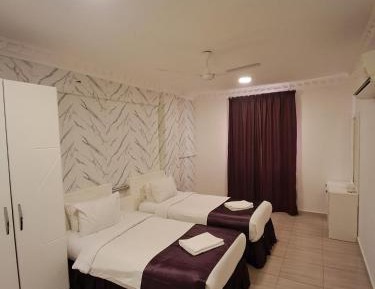 Economy Quadruple Room with Shared Bathroom