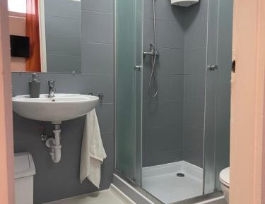 Quadruple Room with Private Bathroom