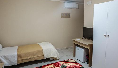 Quadruple Room with Private Bathroom