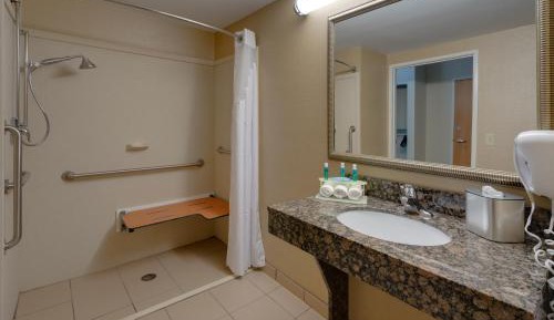 Queen Room with Two Queen Beds Hearing Accessible with Roll-In Shower - Non-Smoking