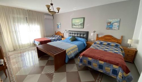 Quadruple Room with Shared Bathroom