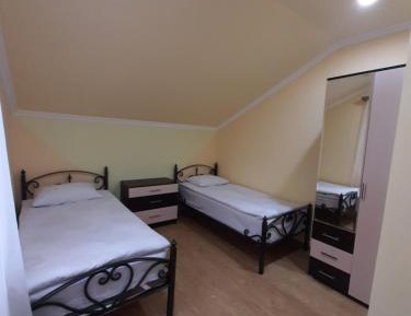 Quadruple Room with Private Bathroom