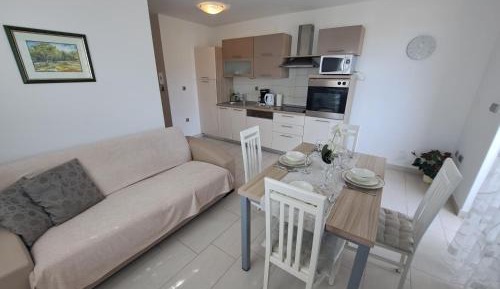 Two-Bedroom Apartment with Balcony and Sea View