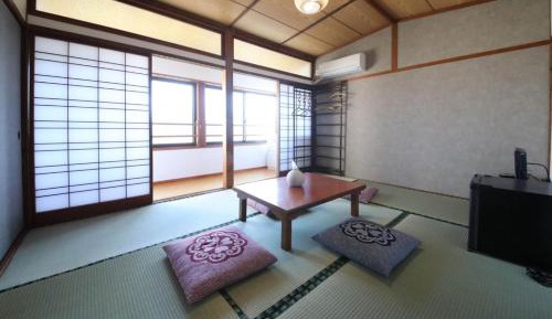 Quadruple Room with Shared Bathroom