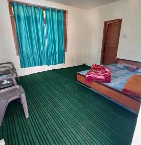 Deluxe Room (2 Adults + 1 Child)