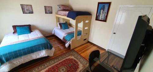 Quadruple Room with Shared Bathroom