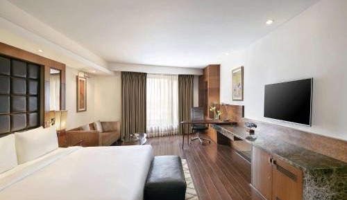 Business Class With Happy Hours 03:00 PM to 06:00 PM ,1+1 & Airport Transfers and Free Pick up and drop to Worldmark Aerocity (subject to car availability)