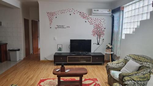 Three-Bedroom Apartment with Balcony