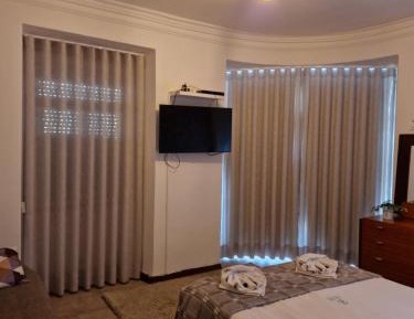 Queen Room with Shared Bathroom