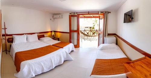 Quadruple Room with Balcony and Shared Bathroom