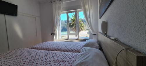 Twin Room with Lateral Sea View