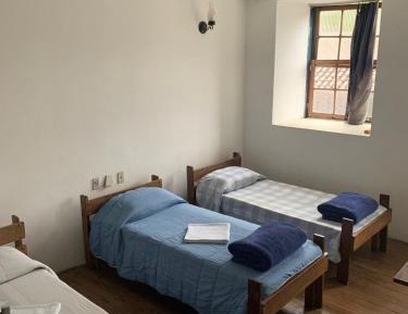 Quadruple Room with Private Bathroom