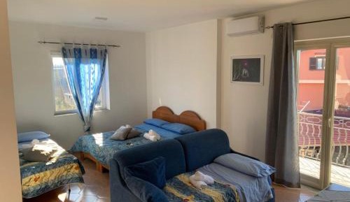 Quadruple Room with Private Bathroom