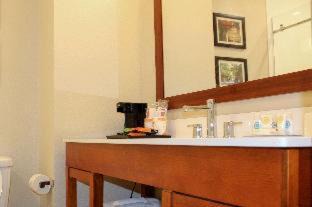 Efficiency Quadruple Room with Two Queen Beds - Non Smoking