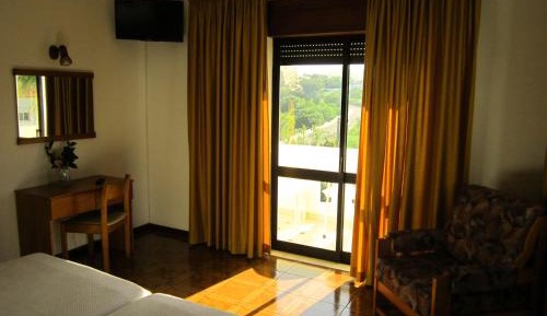 Family Room with Balcony and Pool View