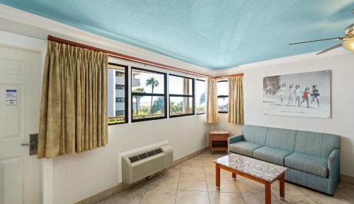 Deluxe Efficiency Suite: 2 Queen Beds and 1 Sleeper Sofa