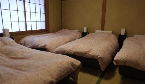 Quadruple Room with Shared Bathroom
