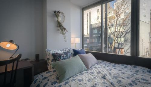 Queen Room with Shared Bathroom